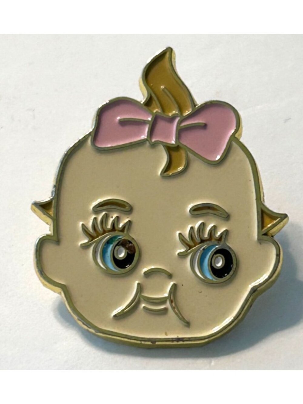 Melanie Martinez Baby Girl Face Lapel Pin from the Crybaby pin pack